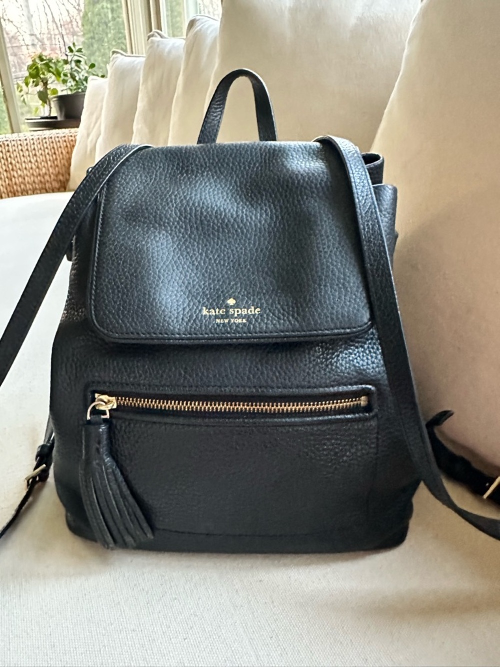 kate spade black pebbled leather drawstring backpack with tassel zipper